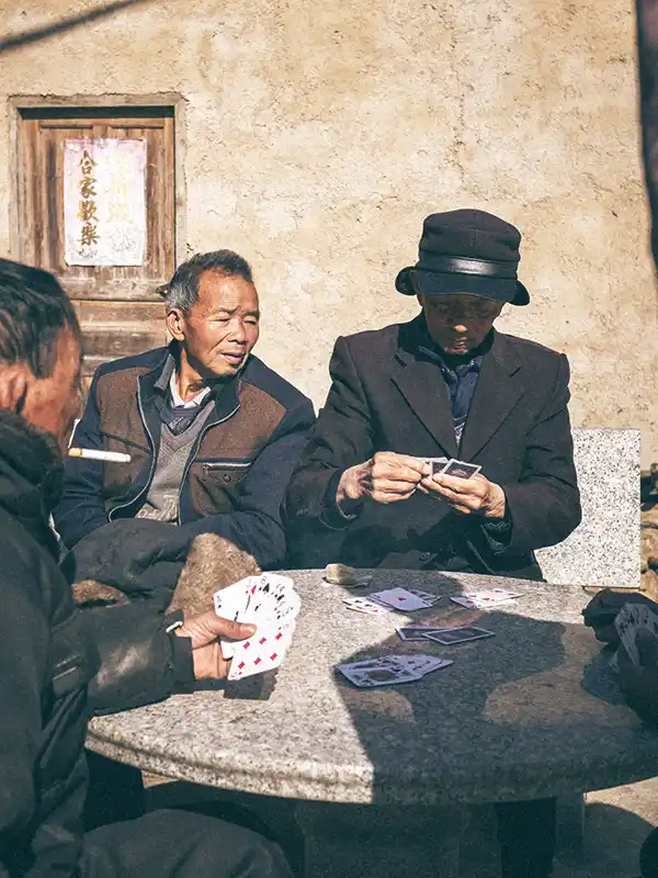 Hands of local playing Hakka cards - from my collection "The Guest Families"
